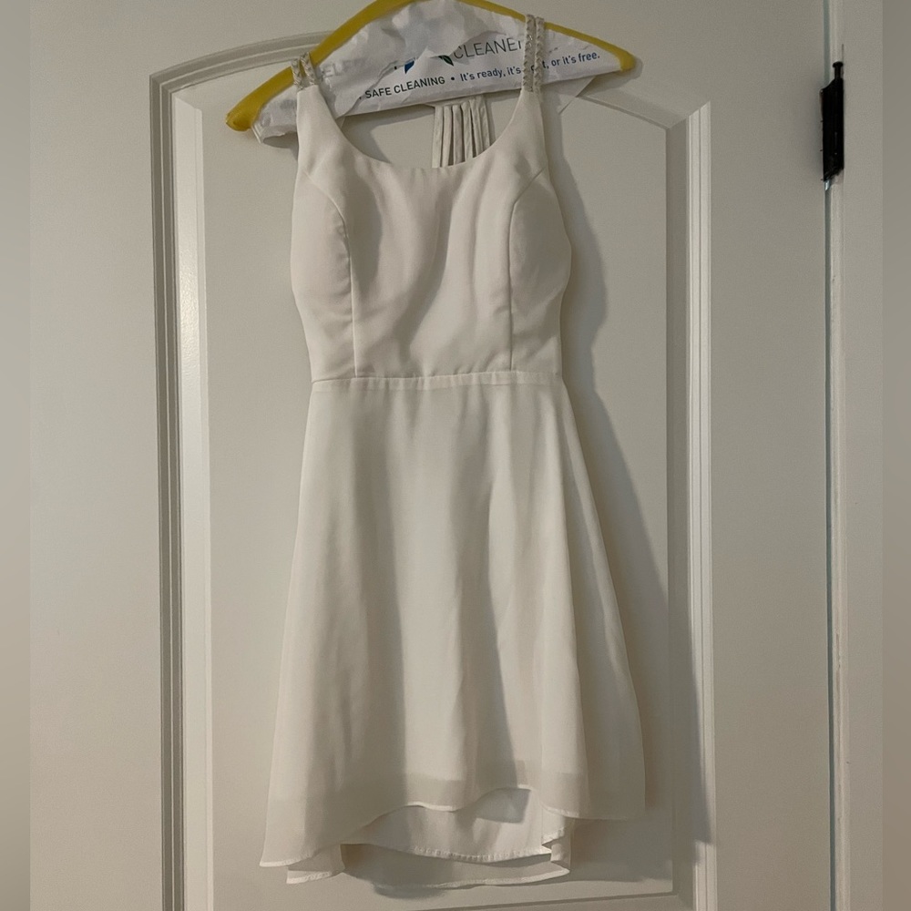White strappy mini dress! Still in good condition.